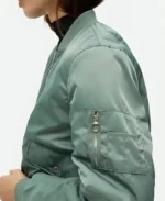 Emma Myers A Good Girl's Guide to Murder Pip Fitz Amobi Green Bomber Jacket Side